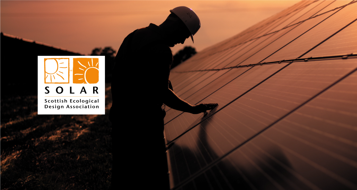 Man inspecting solar panels Man inspecting solar panels