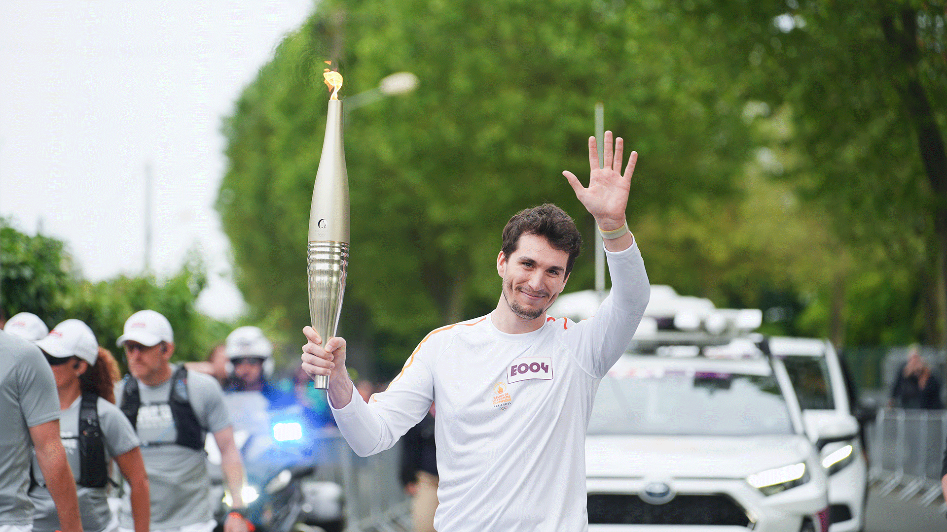Alban Mazars-Simon with Olympic torch