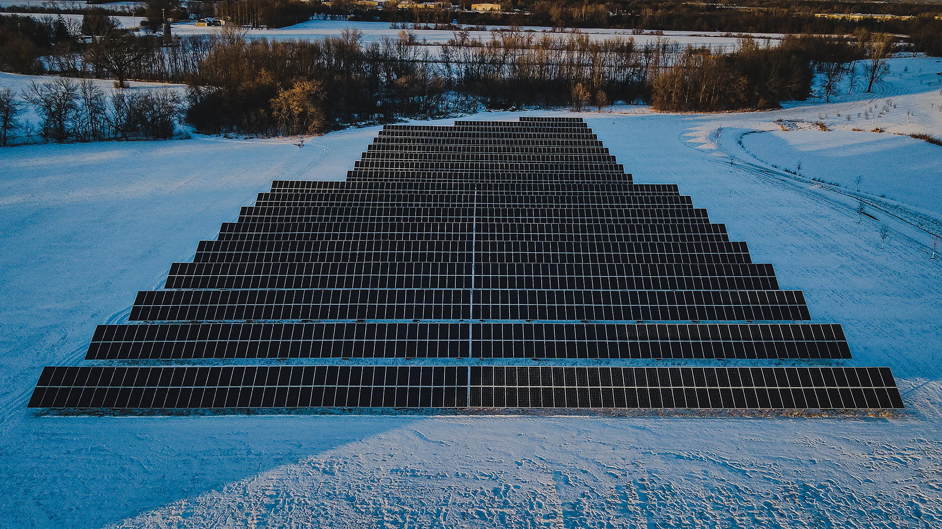 Solar panels in snowy winter landscape Solar panels in snowy winter landscape