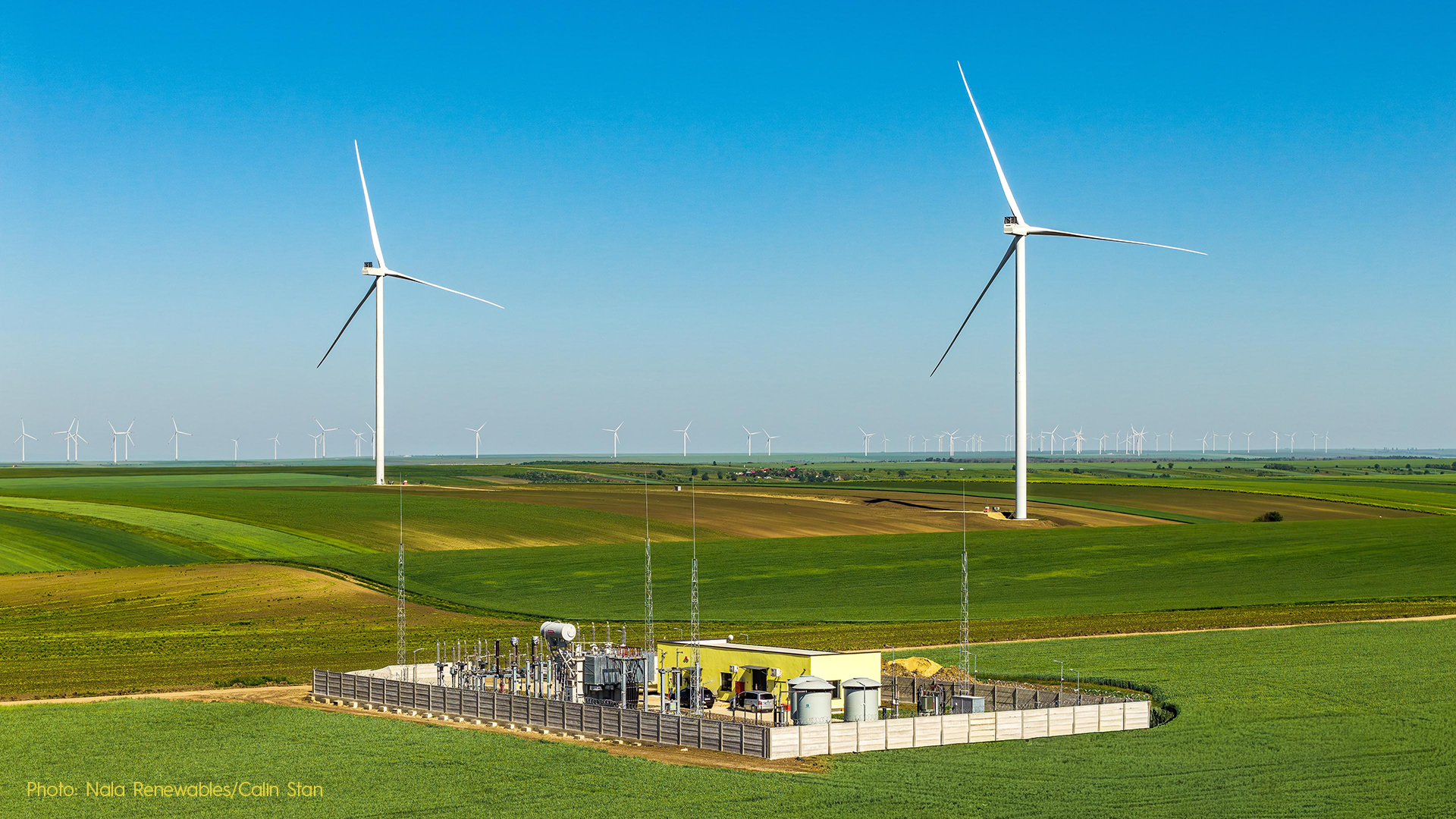 Romanian wind farm in green fields
